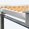 Expanding conveyor system variable expansion